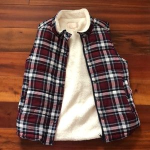 Plaid fuzzy vest.